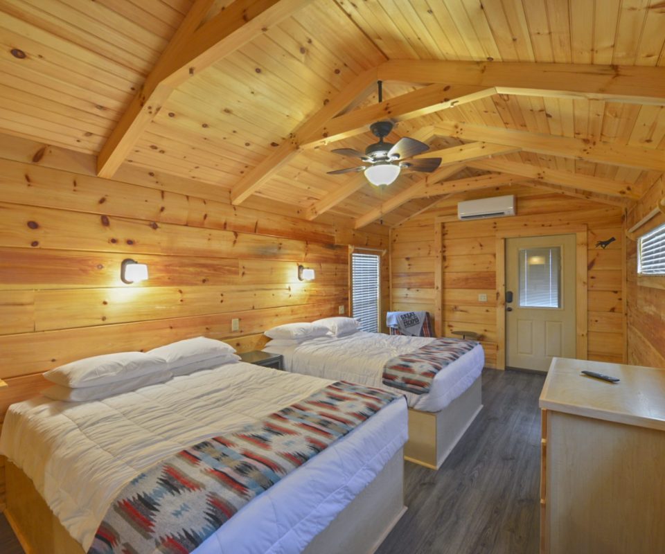 bedroom of the Howdy cabin rental