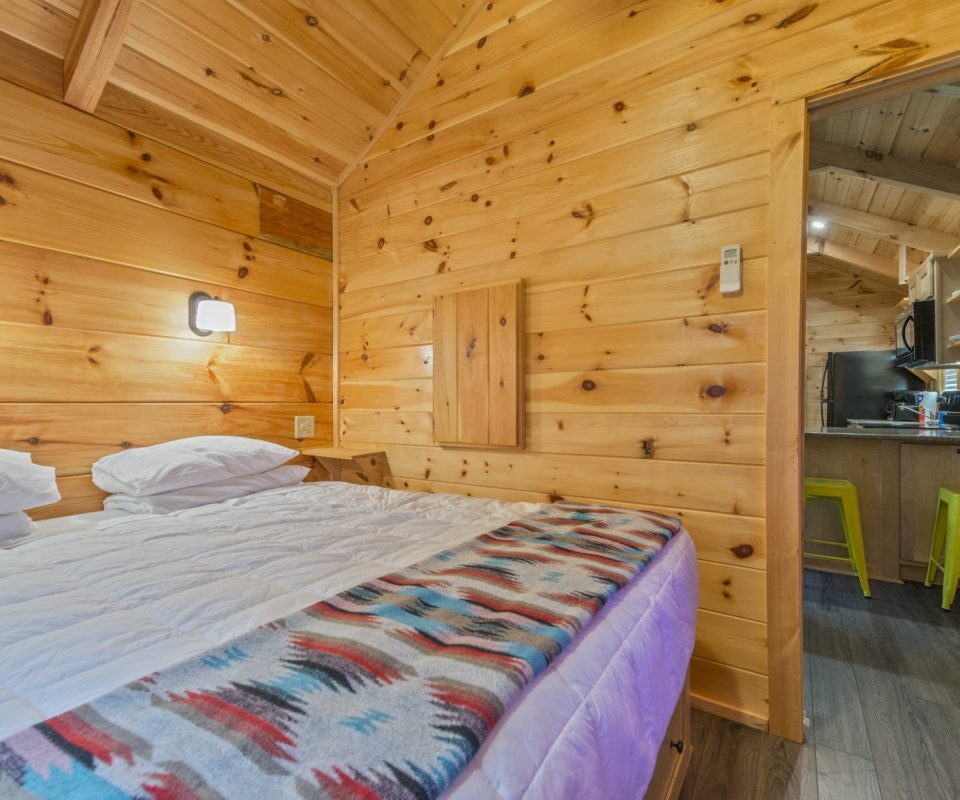 bedroom of Whoop cabin rental