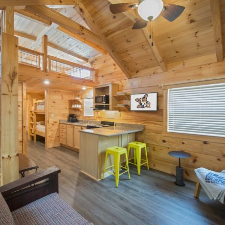 interior of Lonestar Cabin kitchen at Great Escapes RV Resorts Bryan College Station